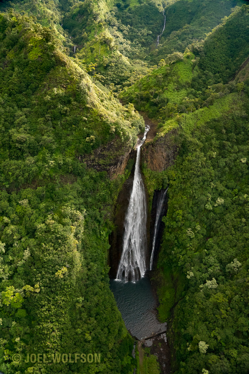 Aerial of a large waterfall on the island of Kauai. It's often necessary to use very high shutter speeds from a helicopter- when combined with a polarizing filter you can end up with very high ISO even in daylight. The Sony A7R II handles it with aplomb! Here I used 1/800 sec, f9.0 at ISO 10,000.