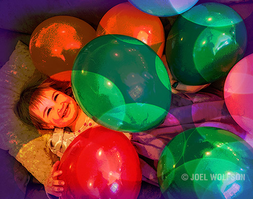 Although there are numerous great presets to use as a starting point I did this one from scratch. In the texture layer I adjusted the size of the texture (oval shapes that mimic the balloons) as well as moving it to highlight the face. Again it was very quick and easy to create this. I saved it as a preset in case I want to use it again.