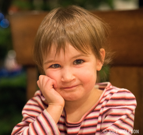 If you are scrutinizing the bokeh in the background of this simple portrait then you have missed the point of the image- a simple portrait of a little girl.