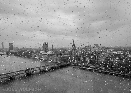 Raining in London? Imagine that! We only had a day in London so one must make the most of it. I shot this from the London Eye, a giant ferris wheel on the River Thames. I wanted to capture the feel of a rainy day looking out the window on London. I chose black and white so color wouldn't distract from the texture, especially the raindrops. With a quick flip of the lever I used the EVF (Electronic Viewfinder) for two reasons- very wide angle lens and to double check that I was holding focus and the scene and still be able to clearly make out the raindrops. Fuji 14mm f2.8 1/60 sec f16 ISO 2000.