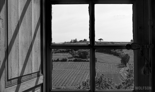 I was lucky enough to get a tour of a private castle in the country in southwestern France. I included the window itself along with the shadows and shutter because I loved how the geometry and forms go with the view. Black and White seemed an obvious choice. X-Pro2