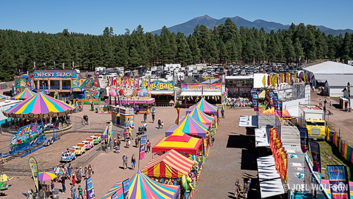 One of the few color photos I shot at the fair, this one is from the ferris wheel where I was able to get a nice vantage point with the mountains in the background. Although I thought the Velvia simulation would be a natural with all the color in the scene it turned out to be just a bit too garish. I went with Provia in Lightroom and jumped into On1 Photo 10 where I bumped the saturation just a tiny bit and also used Dynamic Contrast to provide some depth and separation. X-Pro 2 set to aperture priority, f8.0 1/550 sec. ISO 200